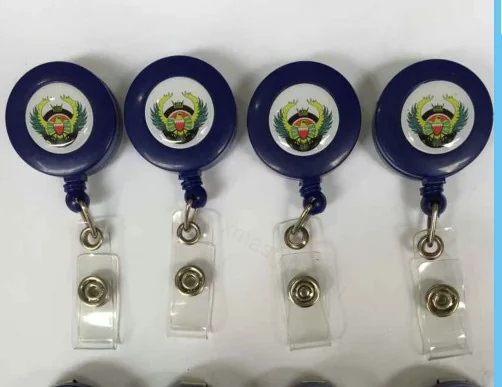 Blue retractable badge reels with Royal Bahraini Air Force emblem