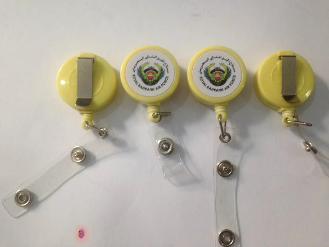 Yellow retractable badge reels with Royal Bahraini Air Force emblem