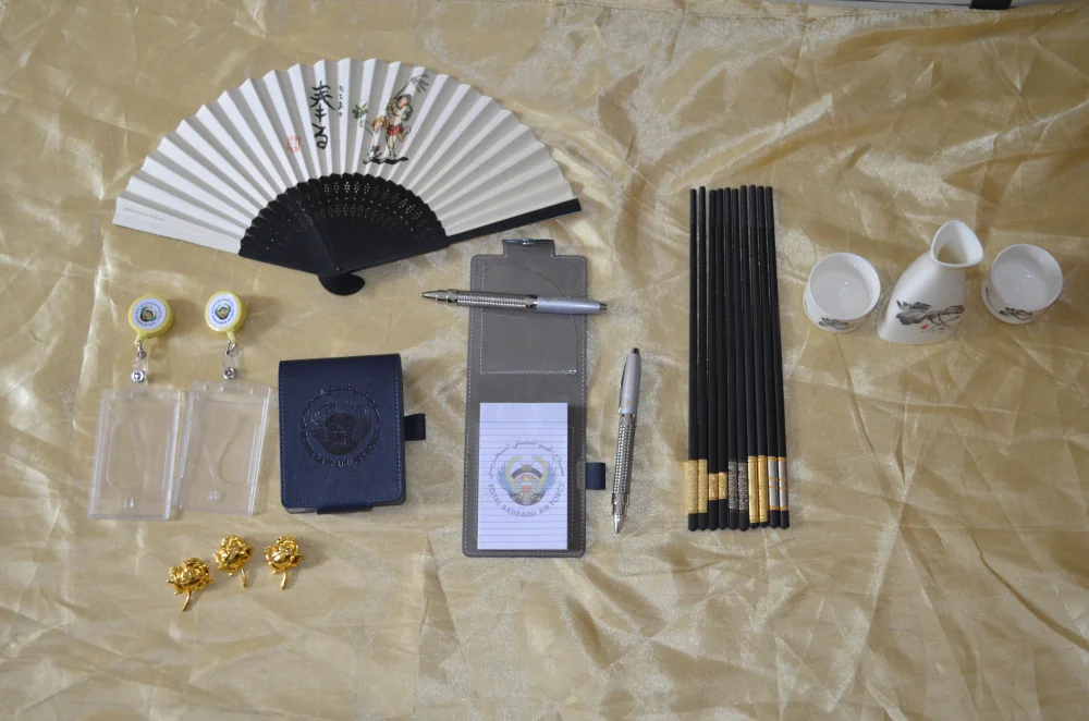 Sample batch prepared for the Bahrain procurement project including branded ID holders, pens and badge reels