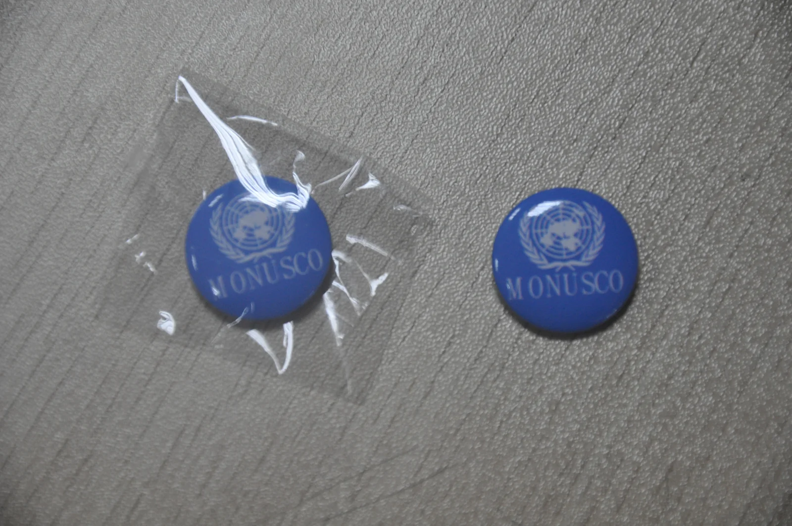 Épinglette ronde bleue de la MONUSCO