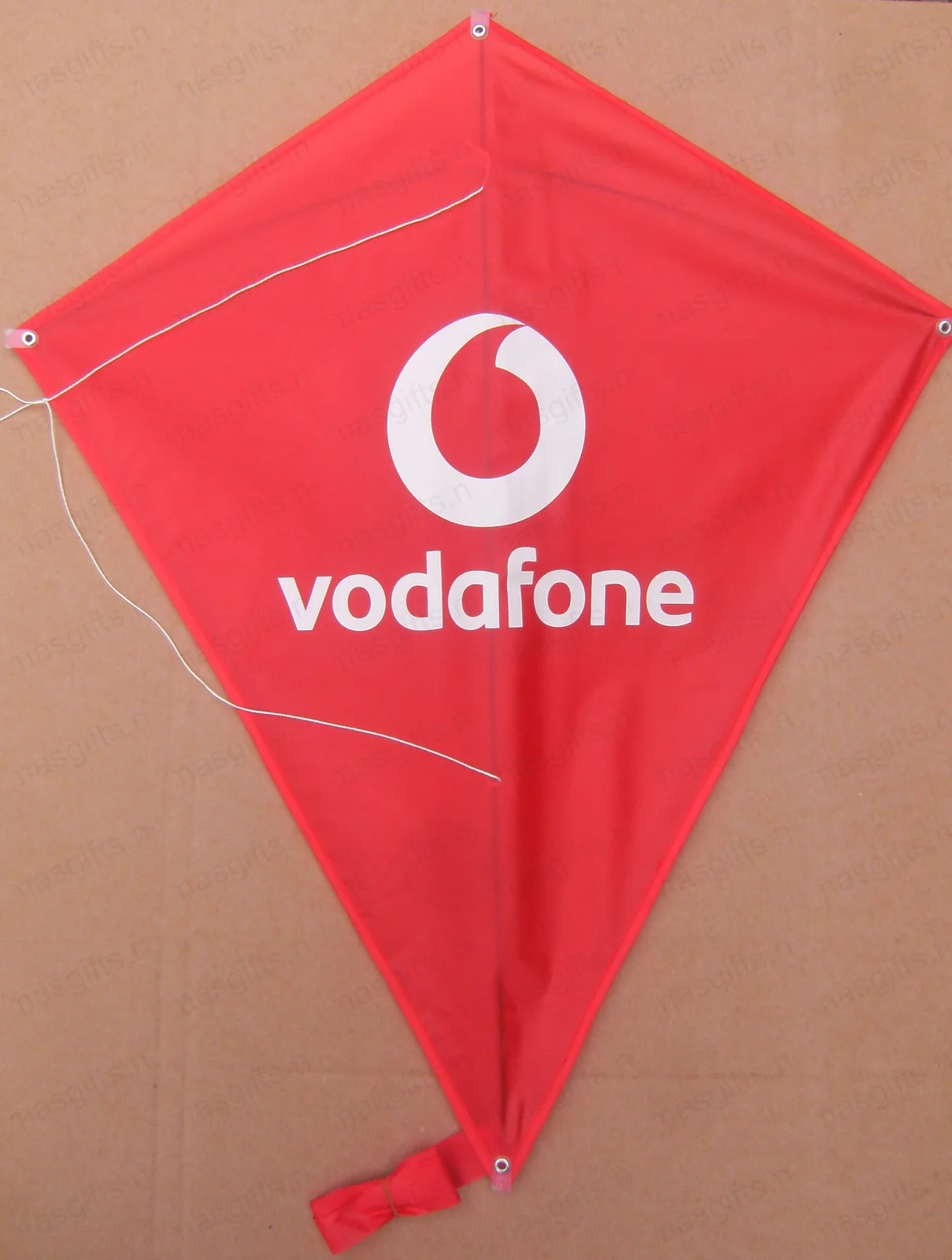 Vodafone branded kite with red speechmark logo