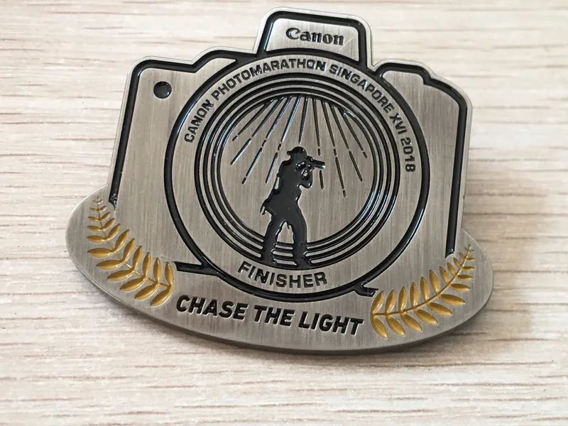 /images/clients/products/tech/canon/canon Lapel Pin